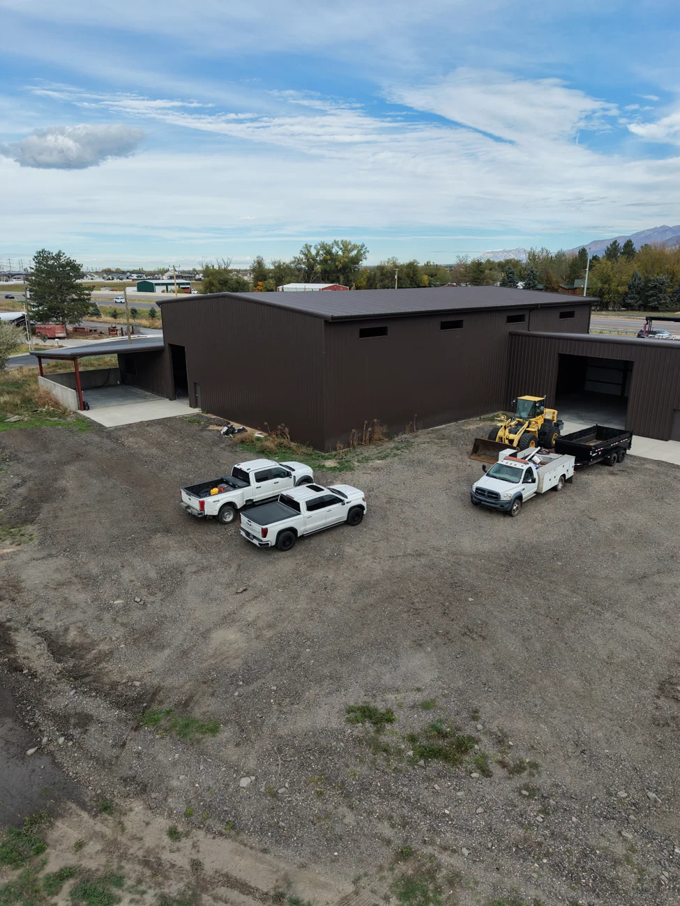 Aerial view of the dark metal Shamrock building in Farmington